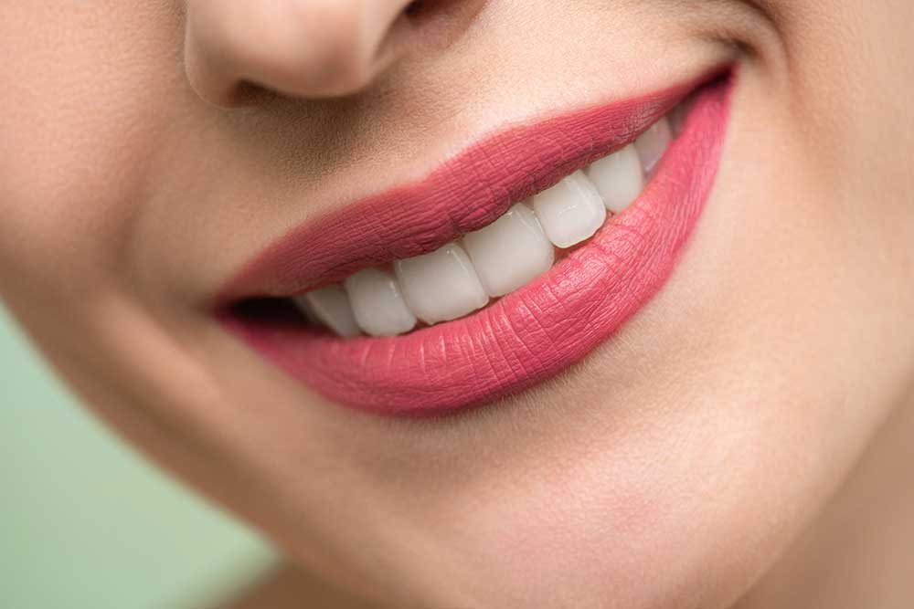 a young girl with a beautiful smile